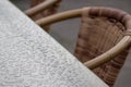 Empty table and empty chairs of summer restaurant or beer garden in summer on rainy day with raindrops and no guests, no income on Royalty Free Stock Photo