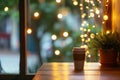 empty table corner, blurred string lights and cafe decor Royalty Free Stock Photo