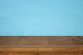 Empty table in front of blue wooden background. For product display montage Royalty Free Stock Photo