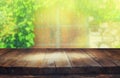 Empty table in front of blurry antique wooden door Royalty Free Stock Photo