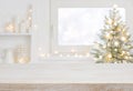 Empty table in front of christmas tree with decoration background Royalty Free Stock Photo