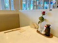 Empty table in Fuji restaurant with beautiful rose in Blueport shopping mall Hua Hin, Thailand March 7, 2019