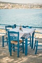 Empty table in greek cafe on Crete Island Royalty Free Stock Photo