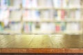 Empty table top on library blurred background Royalty Free Stock Photo