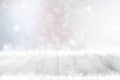 Empty table top or wood floor and blur abstract christmas of background. Empty rustic wooden bright table top with snow in front Royalty Free Stock Photo