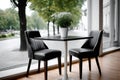 Empty table with two chairs inviting customers in a modern restaurant Royalty Free Stock Photo