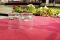 empty table with two glasses on a red tablecloth in Venice. tourism Royalty Free Stock Photo