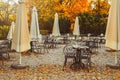 Empty tables and chairs in outdoor restaurant Royalty Free Stock Photo