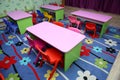 Empty tables . children`s furniture and toys in kindergarten Royalty Free Stock Photo