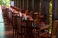 Empty tables with pink napkins on the veranda