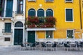 Empty Tables Of Sidewalk Cafe, Venice, Italy