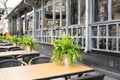 Empty tables in street cafe, chairs in street reastaurant Royalty Free Stock Photo