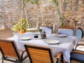 Empty tables of street cafe during lockdown, coronavirus quarantine, Cafe Terrace in old town, outdoor patio chair and table in Royalty Free Stock Photo