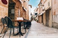 Empty tables of street cafe, Spain Royalty Free Stock Photo