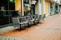 Empty tables on the summer terrace in old town Royalty Free Stock Photo