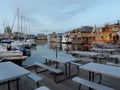 Empty tables at Victoria Fisherman`s Wharf