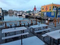 Empty tables at Victoria Fisherman`s Wharf