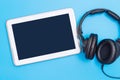 Empty tablet screen with Music headphone Music entertainment concept Royalty Free Stock Photo