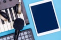 Empty tablet screen with music producer equipment Royalty Free Stock Photo