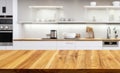 Empty tabletop over defocused kitchen with copy space Royalty Free Stock Photo