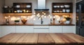 Empty tabletop over defocused kitchen with copy space Royalty Free Stock Photo