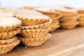 Empty Tartlets on Wooden Table