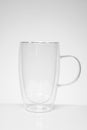 Empty tea or coffee mug made of double transparent glass Royalty Free Stock Photo