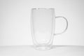 Empty tea or coffee mug made of double transparent glass Royalty Free Stock Photo