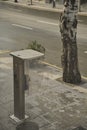 Empty telephone booth in the central Baku street.Coronavirus time.Morning.