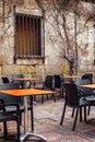 Empty terrace tables in the medieval atmosphere