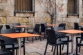 Empty terrace tables in the medieval atmosphere