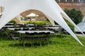 Empty terrace tables on street food festival