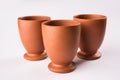 Empty terracotta mug or brown clay coffee cup or jar or drinking glass Royalty Free Stock Photo