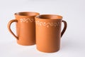 Empty terracotta mug or brown clay coffee cup or jar or drinking glass Royalty Free Stock Photo