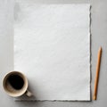 Empty textured white paper with a rough edge, a cup of black coffee, and a pencil on a gray background, providing a clean and Royalty Free Stock Photo