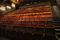 Empty theatre or cinema auditorium hall with rows of seats or chairs Royalty Free Stock Photo