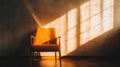 Empty therapist chair with a single ray of sunlight hitting it, the rest of the room Royalty Free Stock Photo