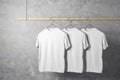 Empty three white tshirts Royalty Free Stock Photo