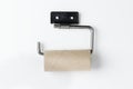 Empty toilet paper roll on a holder Royalty Free Stock Photo