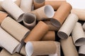 Empty Toilet Rolls Stack Up On a Black Background Royalty Free Stock Photo