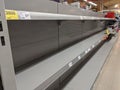 Empty toilet paper shelves in supermarket after panic buying due to outbreaking coronavirus