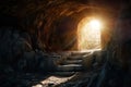 Empty tomb with stone rocky cave and light rays bursting from within. Easter resurrection of Jesus Christ. Christianity Royalty Free Stock Photo