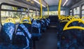 Empty top floor of a London double-decker bus