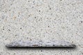 Empty top of polished terrazzo stone shelves on terrazzo wall background,