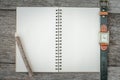 Empty top view of notebook on wooden background with retro style Royalty Free Stock Photo