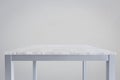 Empty top of white mable stone table isolated on white background Royalty Free Stock Photo