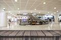 Empty top wood shelves and blurred shopping mall  background. product display template Royalty Free Stock Photo