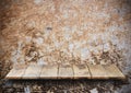 Empty top wooden shelves and stone brick wall background Royalty Free Stock Photo