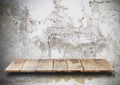 Empty top wooden shelves and stone brick wall background Royalty Free Stock Photo