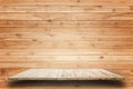 Empty top wooden shelves and wooden wall background Royalty Free Stock Photo